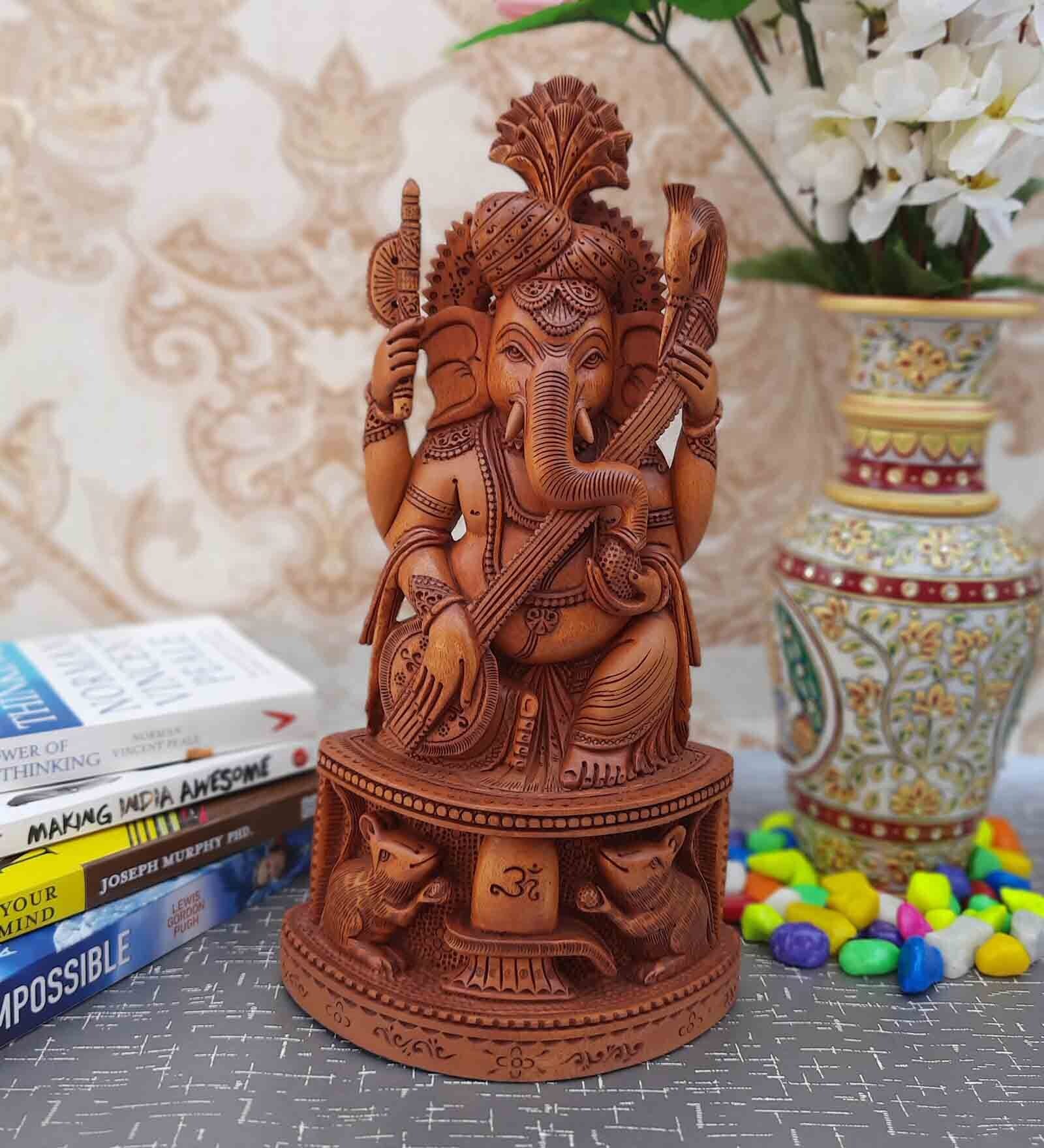 Buy Brown Kadam Wood Ganesha Sitting Playing Sitar Idol By Samriddhi