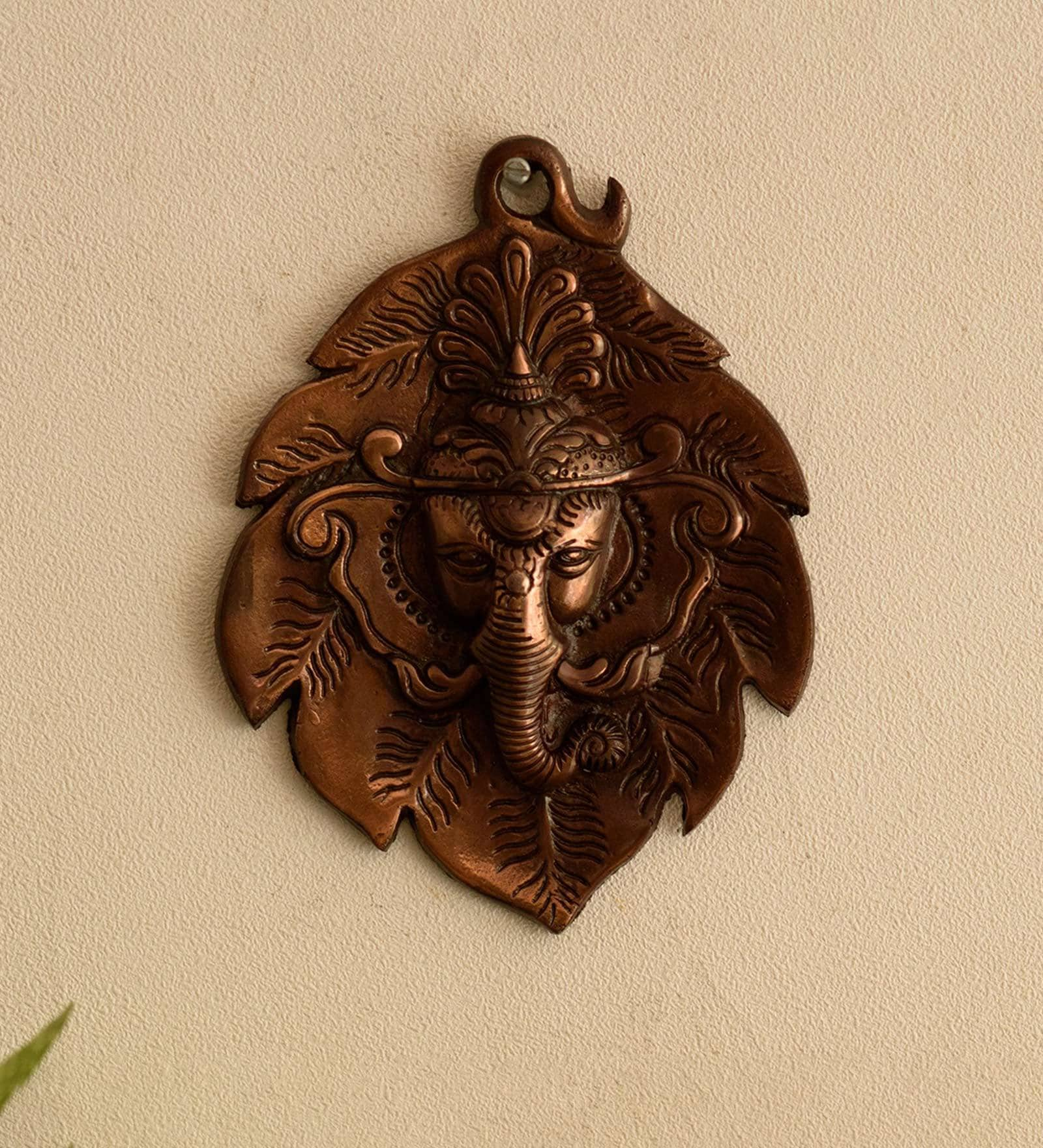 Buy Brown Metal Lord Ganesha Head On Creative Leaf Wall Mural By