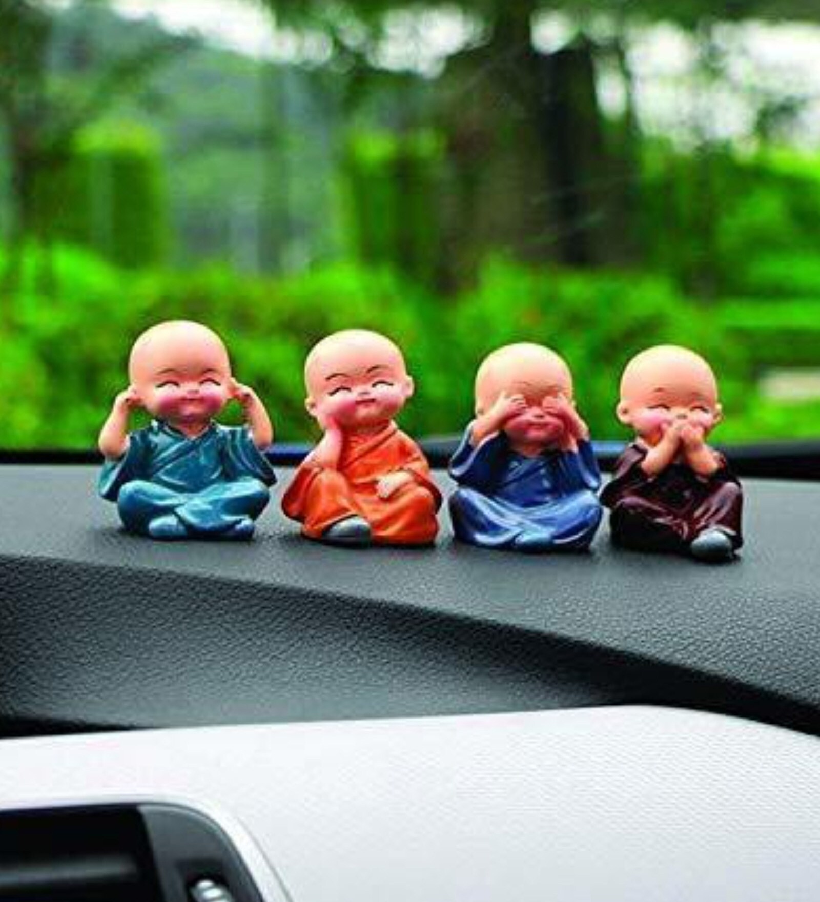 (Pack of 4) Monks Buddha Polyresin Religious Idol (Multicolor)