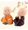 (Pack of 4) Monks Buddha Polyresin Religious Idol (Multicolor)