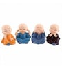 (Pack of 4) Monks Buddha Polyresin Religious Idol (Multicolor)