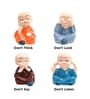 (Pack of 4) Monks Buddha Polyresin Religious Idol (Multicolor)