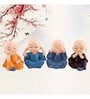 (Pack of 4) Monks Buddha Polyresin Religious Idol (Multicolor)