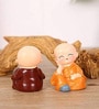 (Pack of 4) Spring Monks Buddha Polyresin Religious Idol (Multicolor)