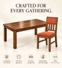 Aalaya 6 Seater Dining Set In Provincial Teak Finish With Terracotta Orange Colour Chair Aalaya 6 Seater Dining Set In Provincial Teak Finish With Terracotta Orange Colour Chair