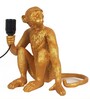 Sitting Monkey Gold Shade Table Lamp With Matte Base