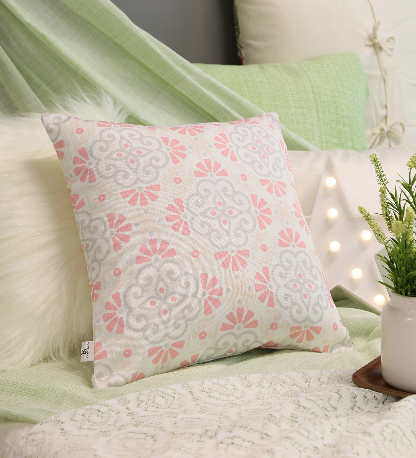 Aaira Pink Cushion Cover With Symmetric Patterns