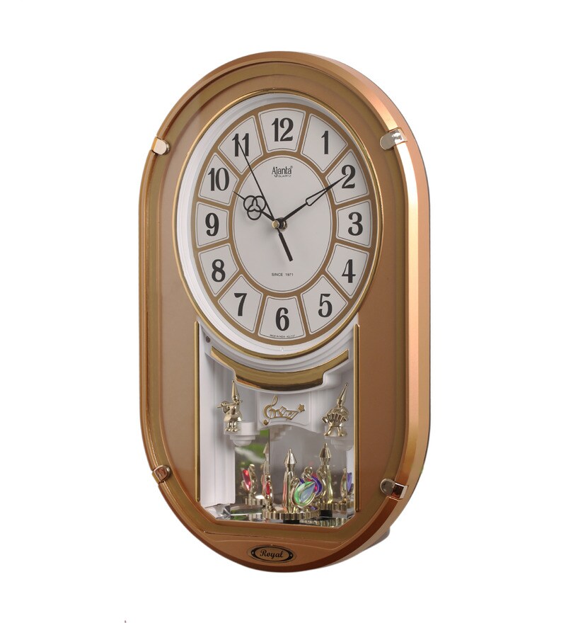 Buy Ajanta Contemporary Copper Wood, Plastic and Glass 8 x 24 Inch Musical Pendulum Wall Clock