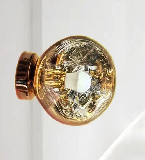 Amber Glass Globe Decorative Wall Light with Warm Glow