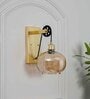Ambre Single Light Wall Light In Amber & Brass Finish