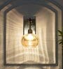 Ambre Single Light Wall Light In Amber & Brass Finish