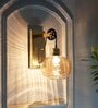 Ambre Single Light Wall Light In Amber & Brass Finish