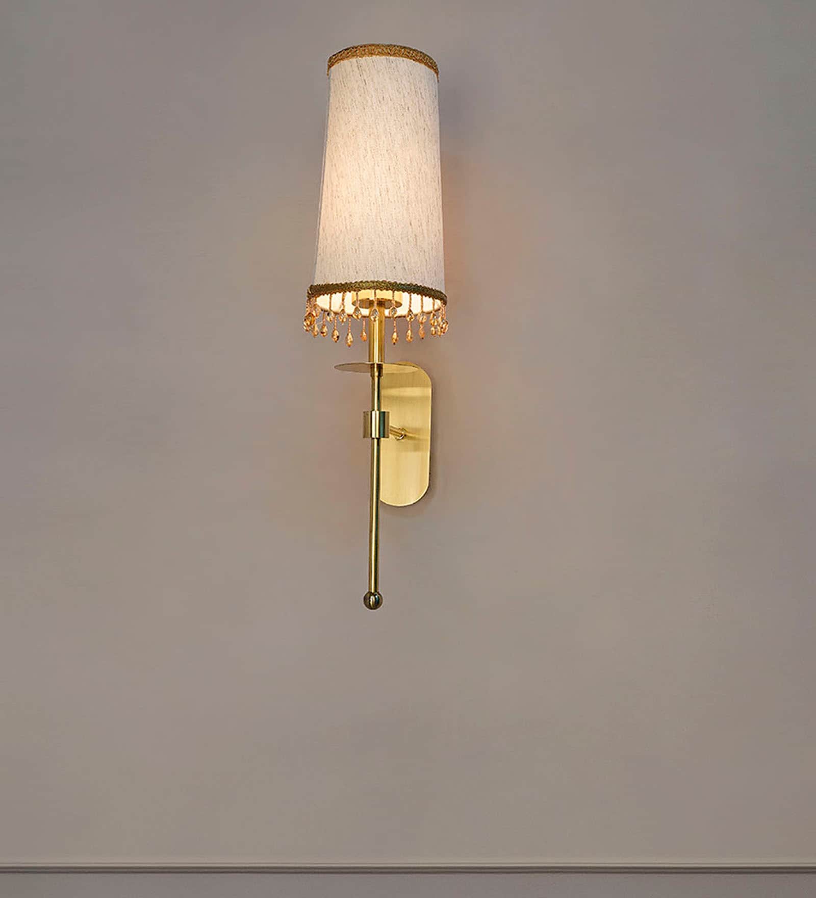 Antique Brass Long Arm Wall Sconce with Beaded Tassel Shade