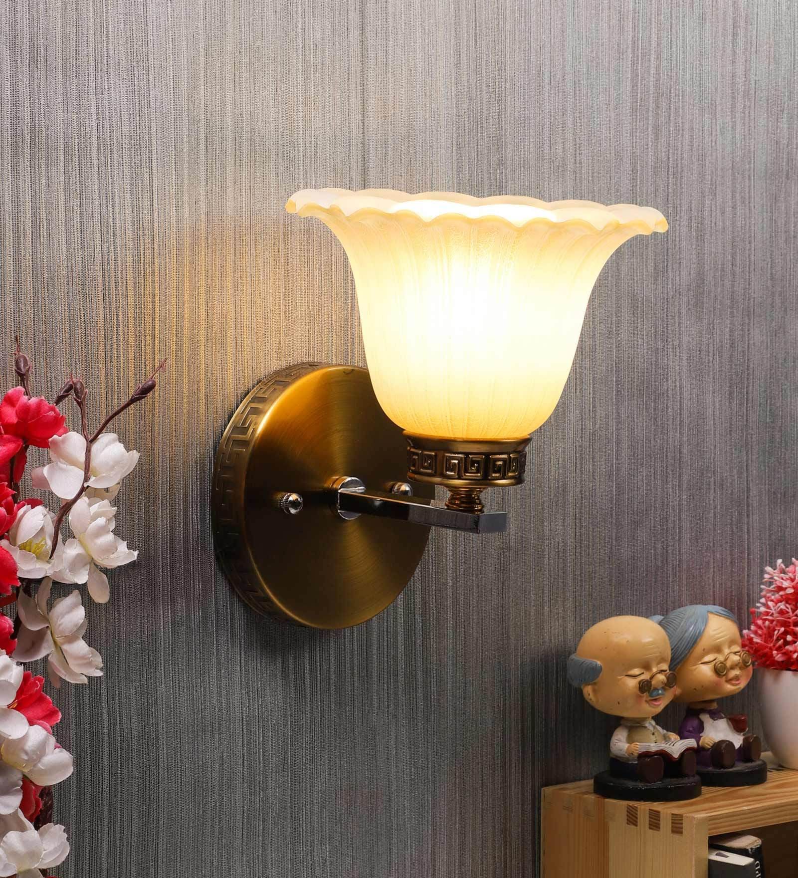 Buy Antique Gold Metal Wall Light by Eliante by Jainsons Lights at 47
