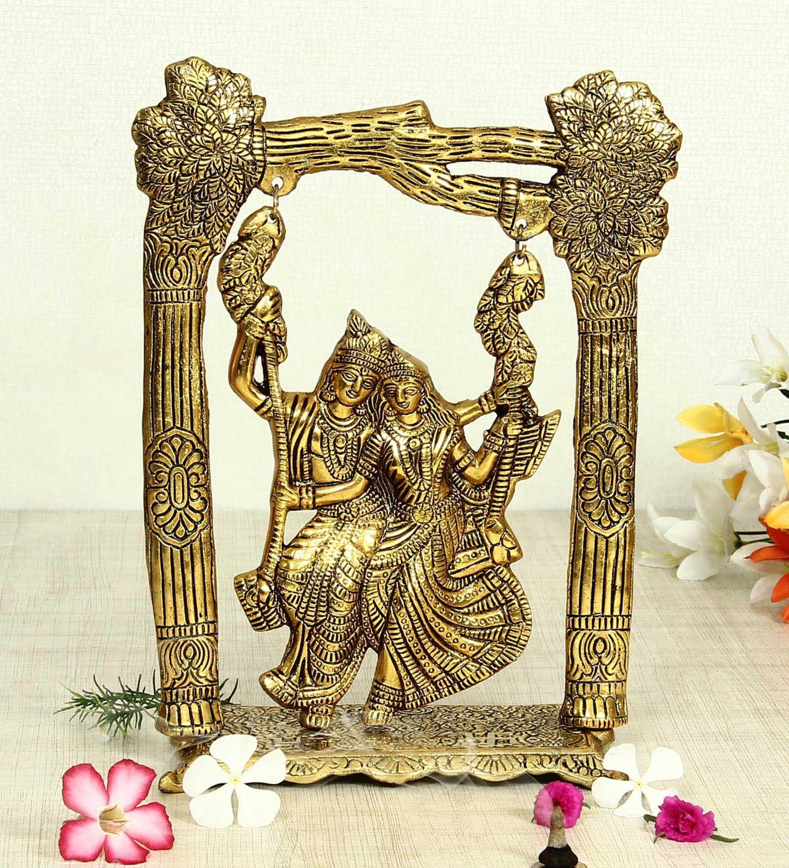 Antique Golden Aluminium Radha Krishna On A Swing Carved In Antique Golden Finish Idol