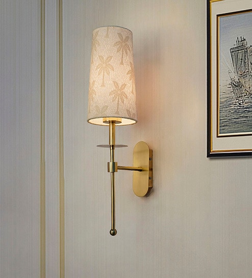 Antique Brass Long Arm Wall Sconce with Palm Motif Shade