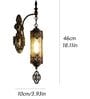Antique Bronze Hanging Wall Lamp with Ornate Metal & Glass Shade
