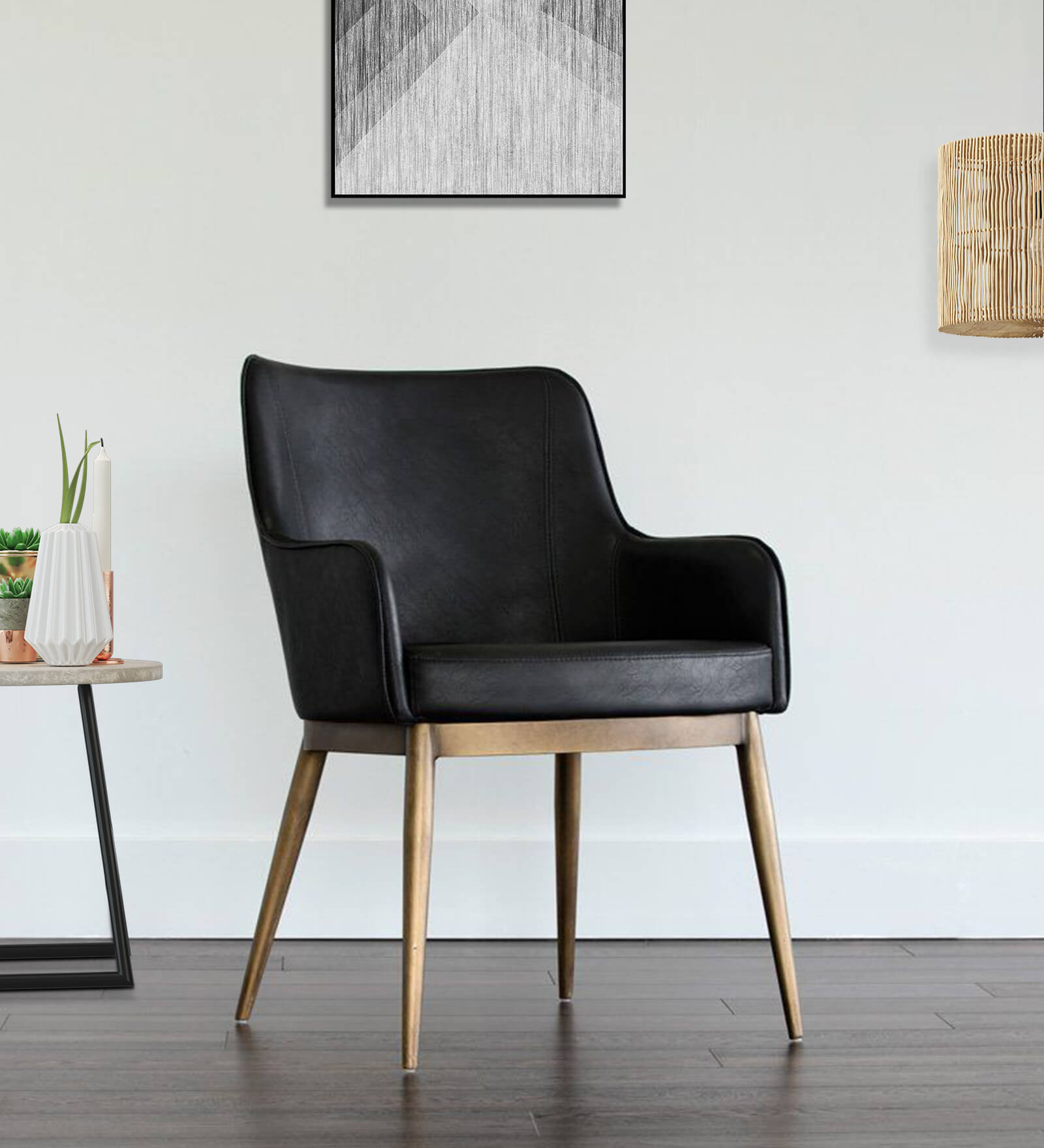 Asko Leatheratte Arm Chair in Black Colour