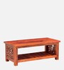 Aura Sheesham Wood Coffee Table In Honey Oak Finish