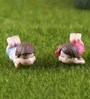 Boy And Girl Resting Garden Figurine