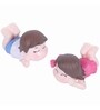Boy And Girl Resting Garden Figurine