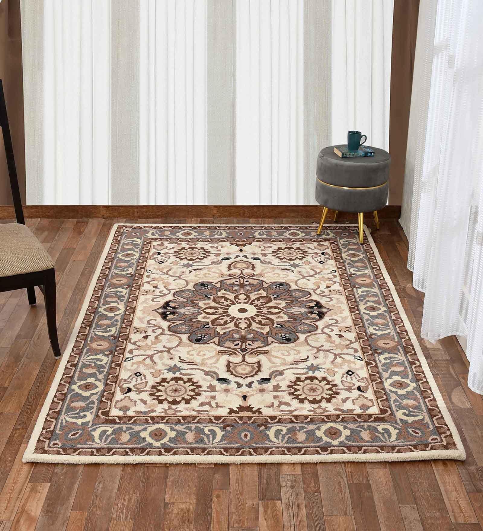 Beige Traditional Wool 6 ft x 9 ft Hand Tufted Carpet