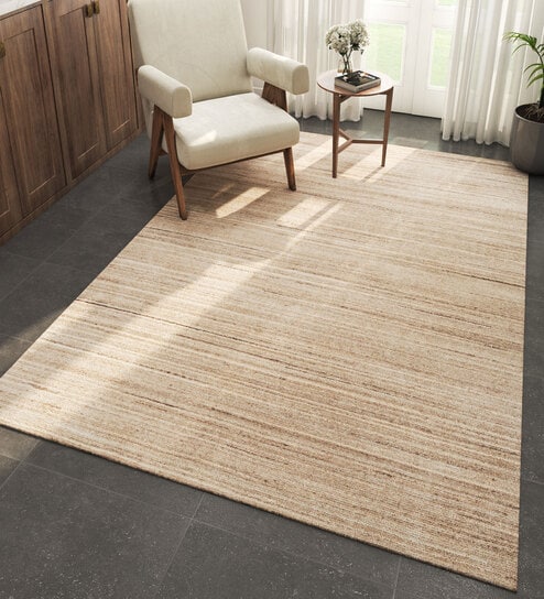 Beige Solid Wool 6 ft X 9 ft Hand Woven Carpet