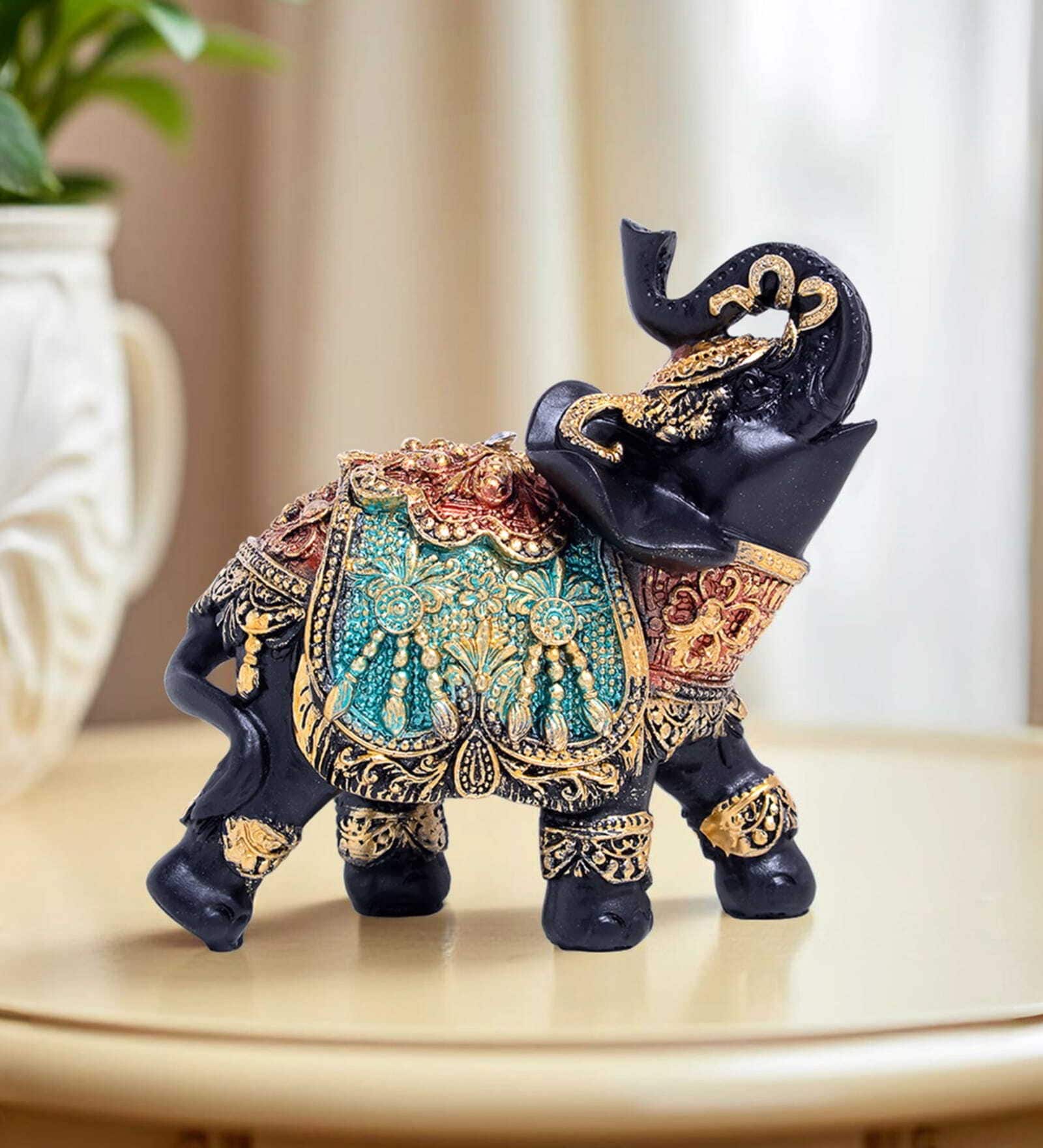 Black & Gold-Toned Elephant Figurine Showpiece