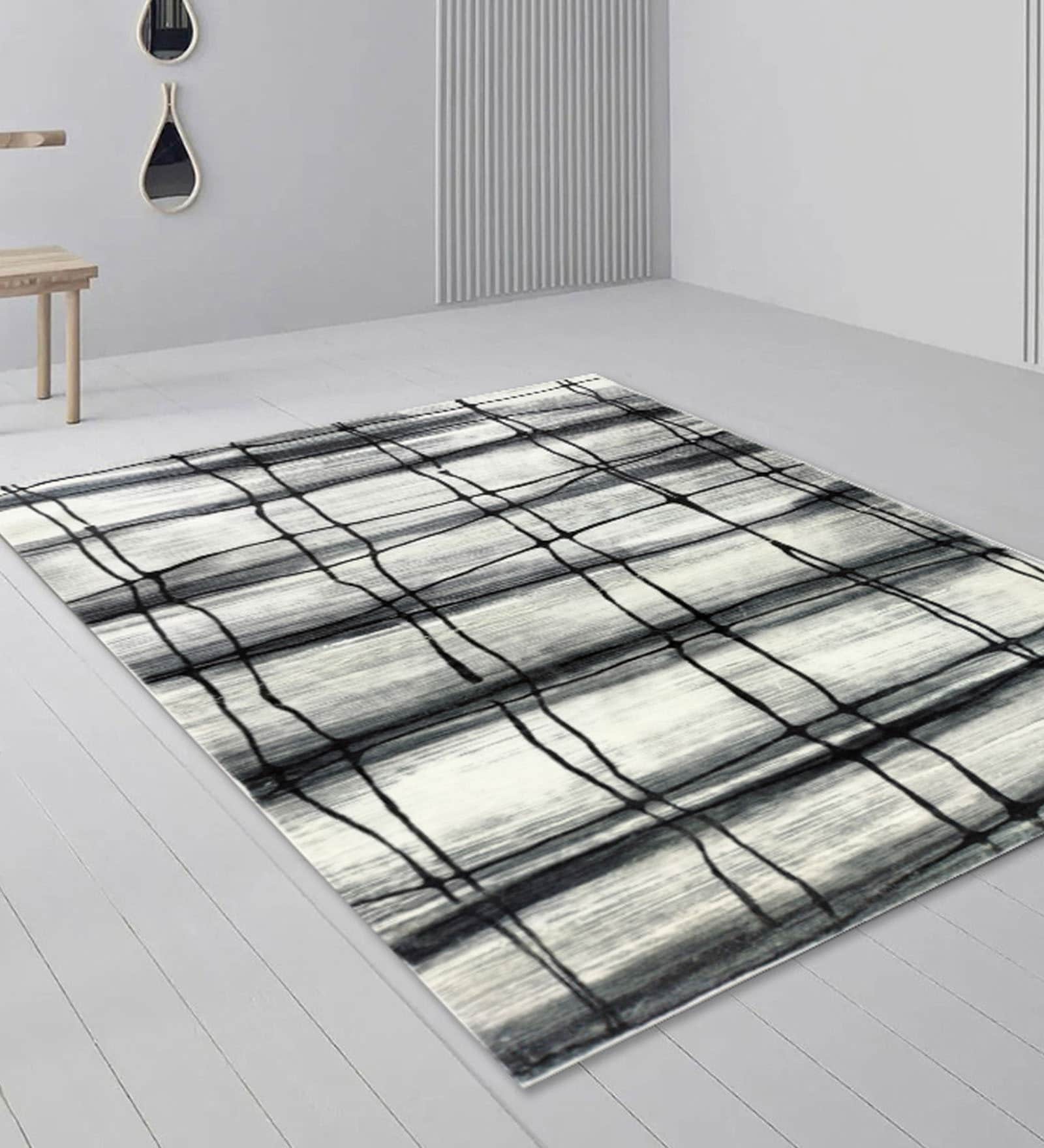 Black Abstract Polyester 5 ft X 7 ft Machine Made Carpet
