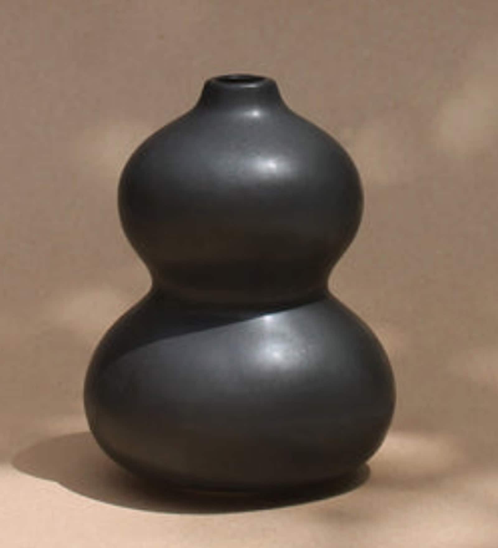 Buy Black Ceramic Planck Table Vases at 33 OFF by Purezento Pepperfry