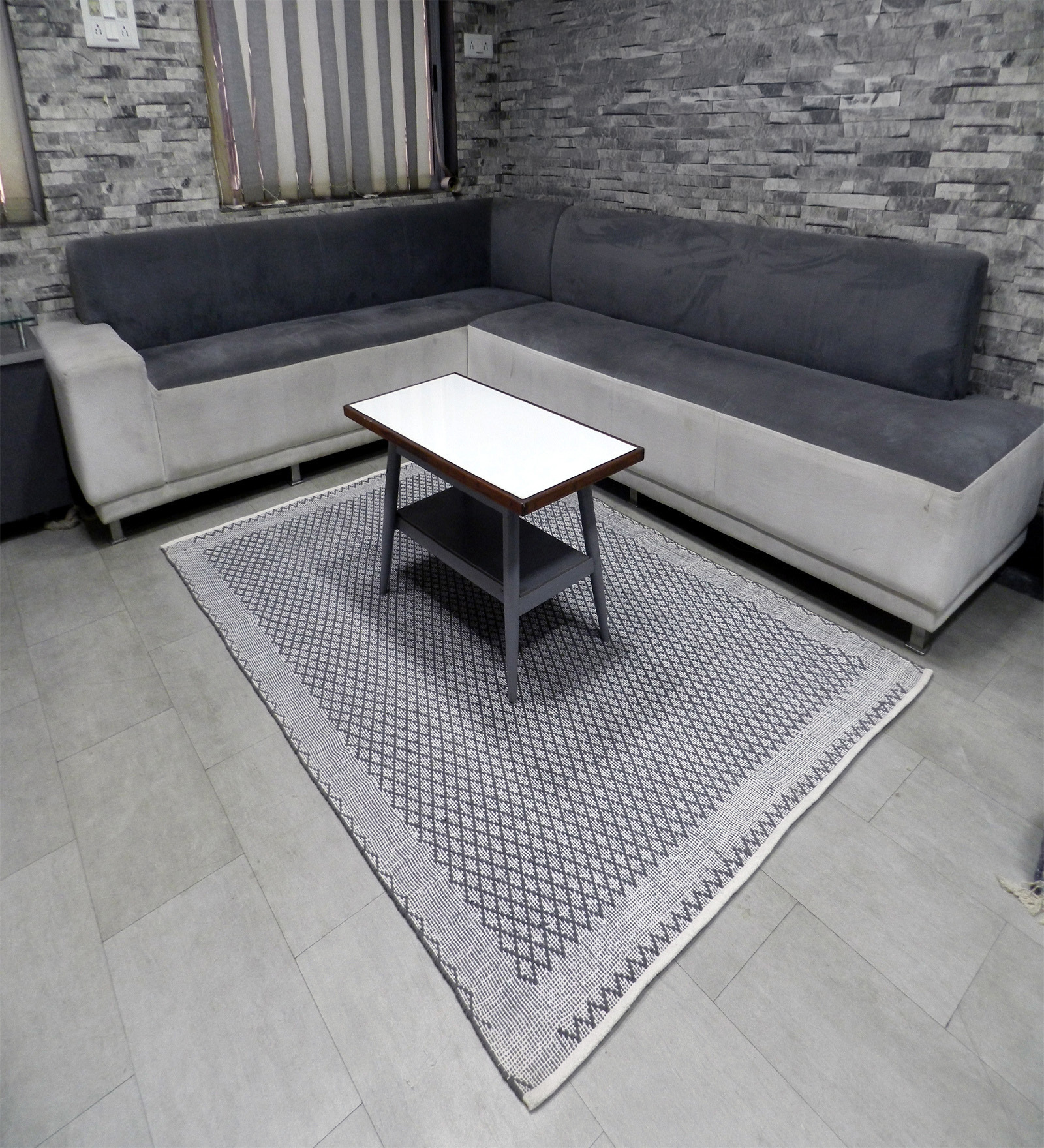 Black Geometrical Cotton 7X5 Feet Hand Woven Carpet