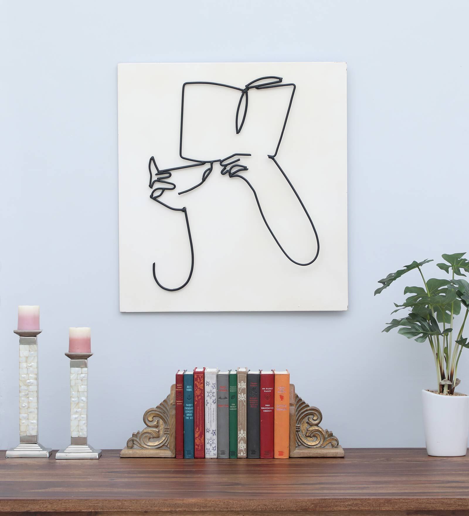 Buy Black Iron Boy Book Metal Wall Art at 45% OFF by Desert Oak | Pepperfry