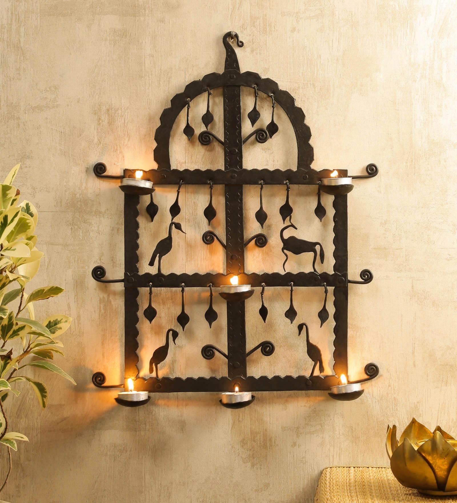 Buy Black Metal Wall Tea Light Holder by Chinhhari Arts at 14 OFF by