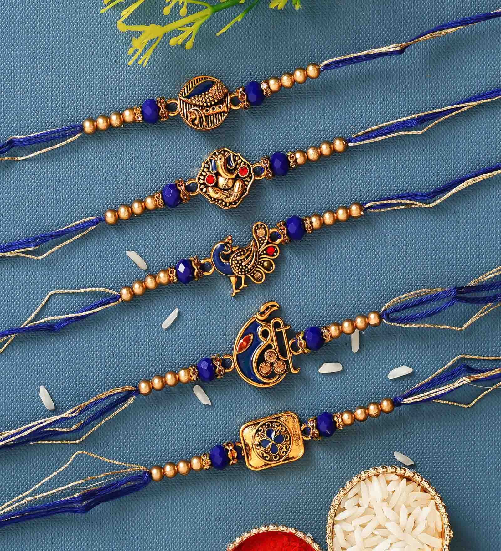 Buy Blue & Golden Set of 5 Religious Rakhis with Roli Chawal Pack at 50 ...