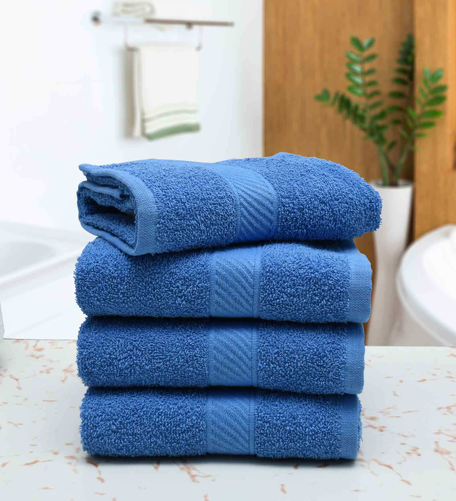 Buy Blue Solid 400 GSM Cotton Hand Towels (Set of 4) by RANGOLI at 10 OFF by RANGOLI Pepperfry