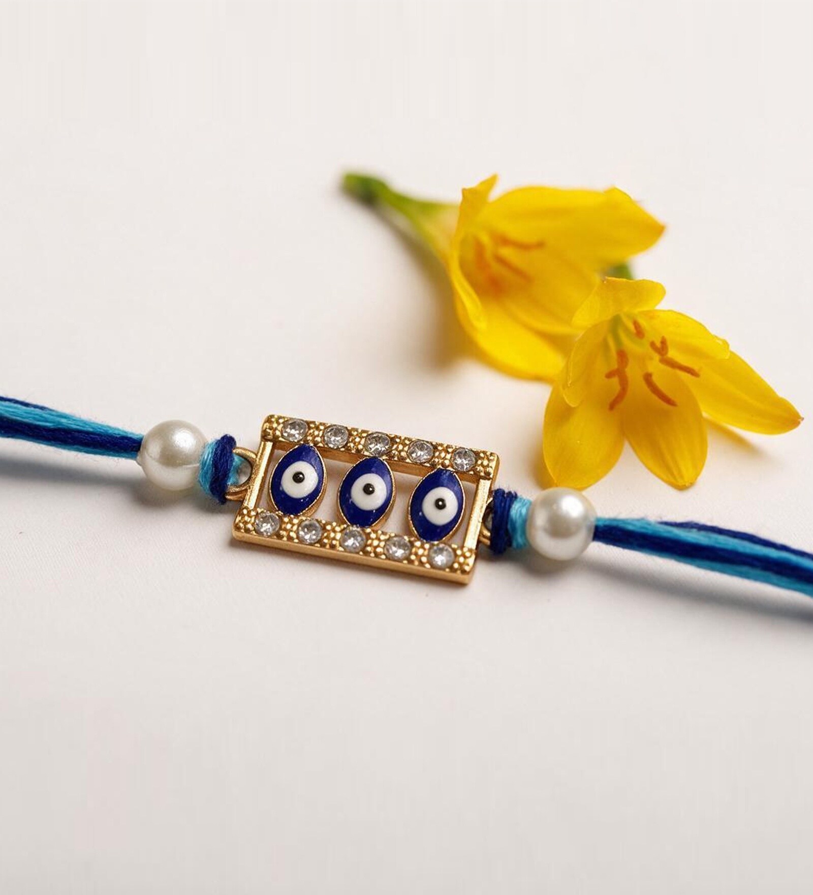 Blue Handmade Triple Evil Eye Rakhi With Crystal Stones & Anchor Cotton Thread
