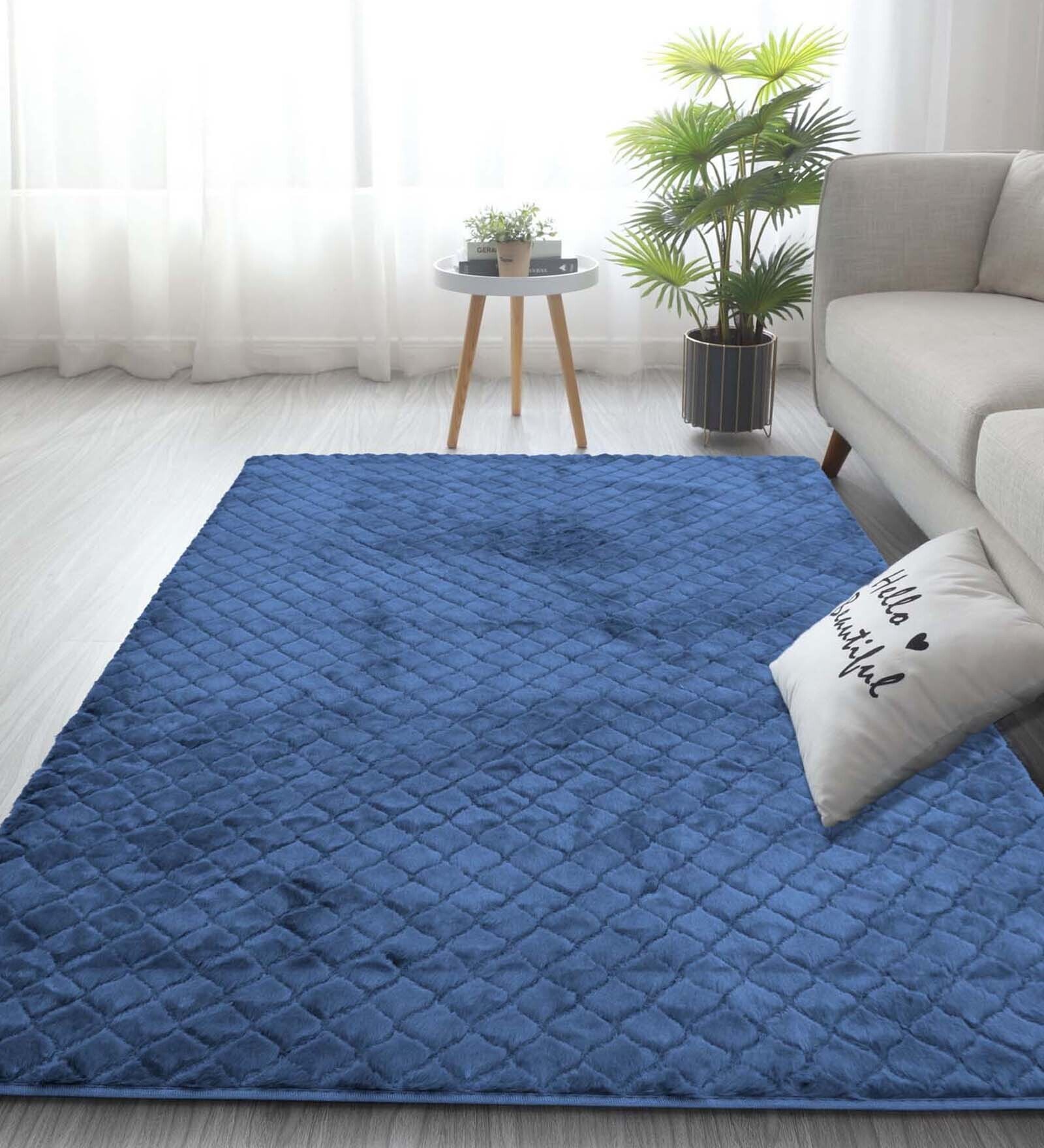 Blue Solid Polyester 6 ft x 9 ft Machine Made Carpet