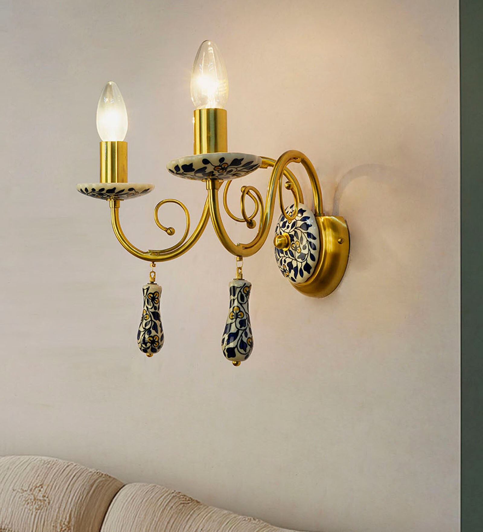 Blue Pottery Elegance: Handcrafted Floral Wall Sconce