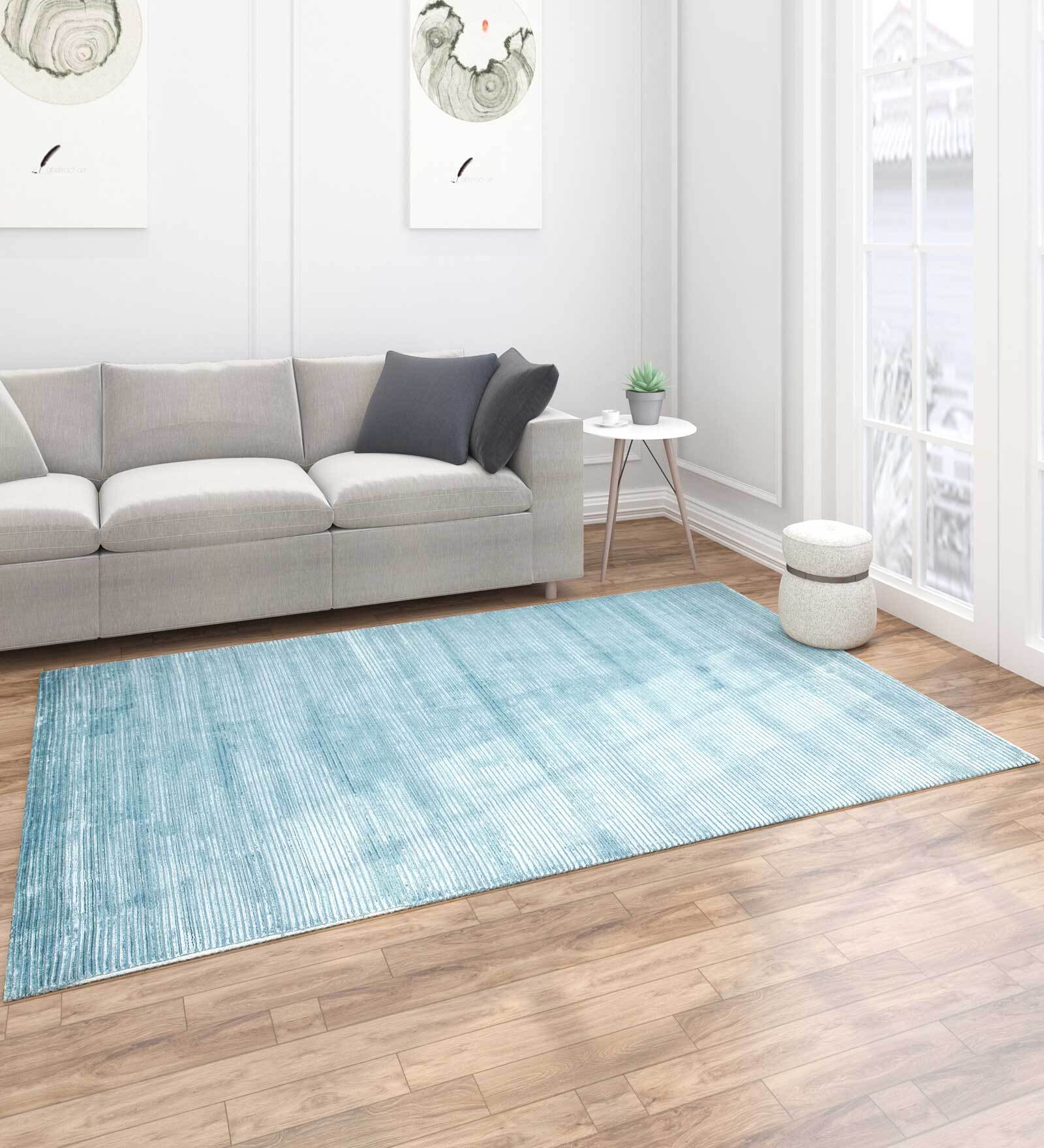 Buy Blue Solid Wool 9 X 12 ft Hand Woven Carpet by Jaipur Rugs at 25