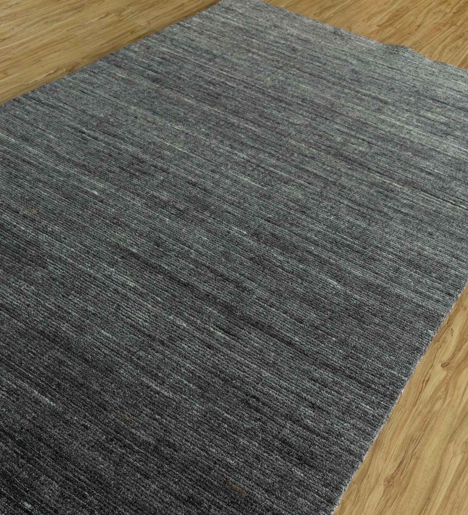 Blue Solid Wool 5 ft x 7 ft Hand Woven Carpet