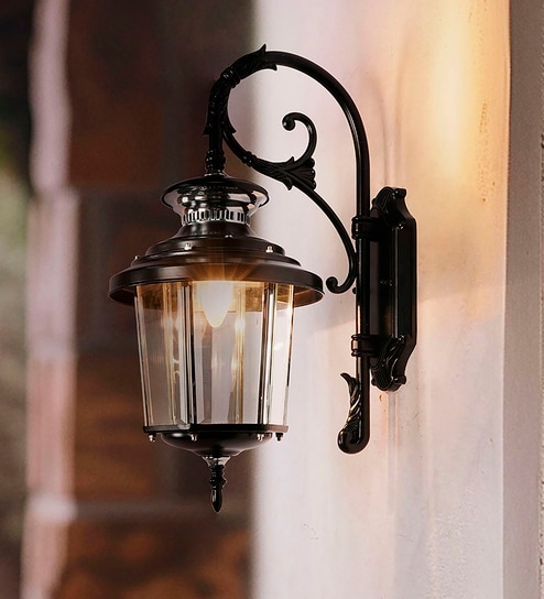 Black Victorian Outdoor Wall Sconce with Scrolling Arm and Beveled Glass