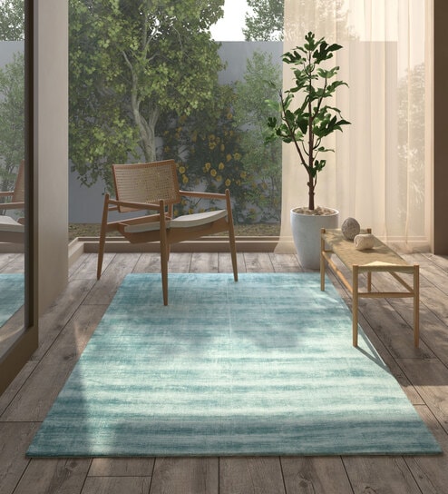 Blue Solid Viscose 5 ft X 8 ft Hand Woven Carpet