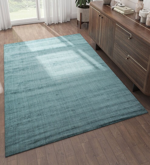 Blue Solid Viscose 5 ft X 8 ft Hand Woven Carpet