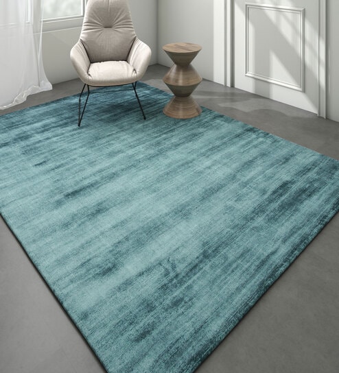 Blue Solid Viscose 5 ft X 8 ft Hand Woven Rectangle Carpet