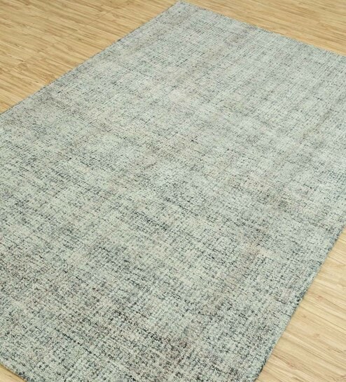 Blue Solid Wool 5 ft x 7 ft Hand Tufted Carpet