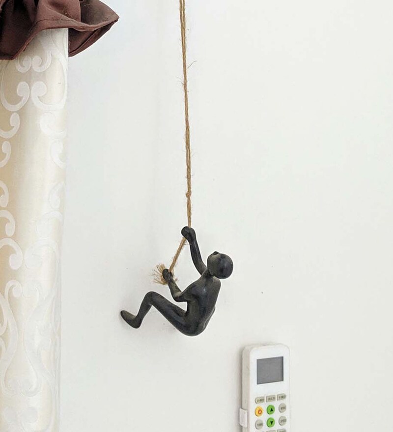 Buy Black Resin Climbing Man Wall Decor Showpiece By Atrangi