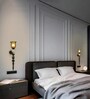 Black & Gold Metal Wall Sconce with Amber Glass Shade