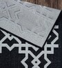 Black Geometric Polypropylene 8 ft x 10 ft Machine Made Carpet