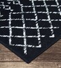 Black Geometric Polypropylene 6 ft x 9 ft Machine Made Carpet