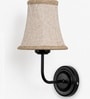 Black Wall Mounted Lamp with Beige Jute Shade & Dining Area
